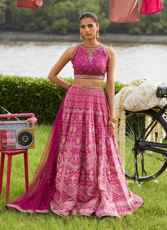 Magenta raw silk lehnga with silk choli and net dupatta – view 1 – Poshaq