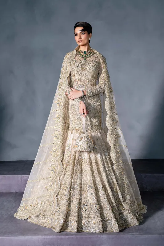 Off white bridal lehenga with embroidered bodice and flared skirt – view 1 – Poshaq