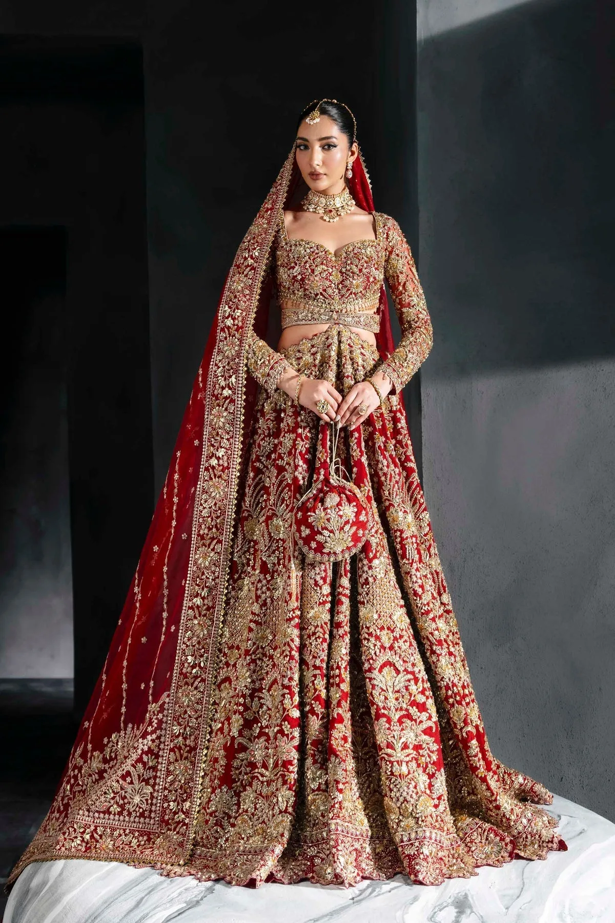 Red bridal lehenga with gold embroidery, sweetheart neckline and full sleeves – view 1 – Poshaq