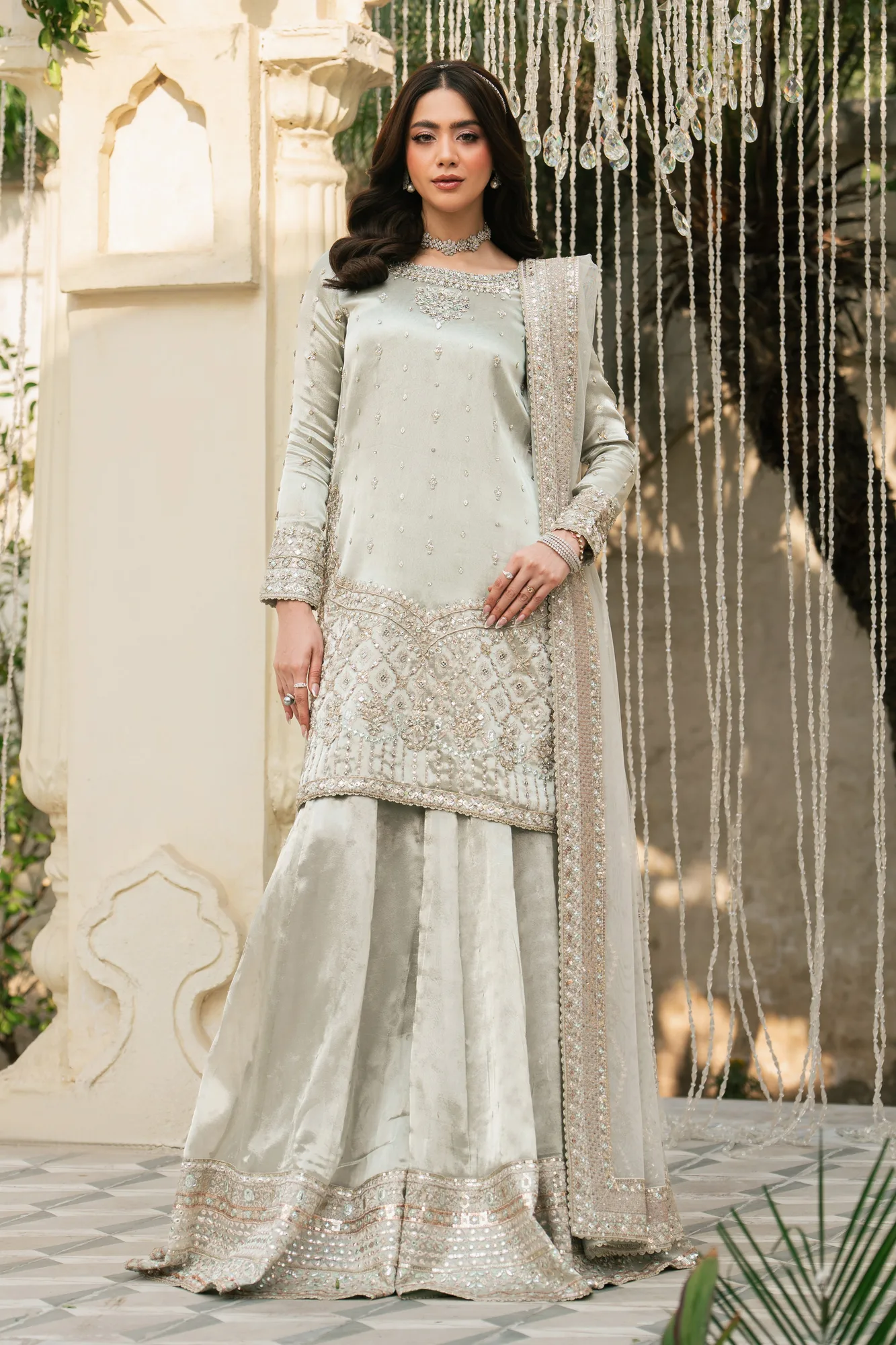 Silver 3‑piece formal outfit with tissue top, net dupatta and flared sharara – view 1 – Poshaq