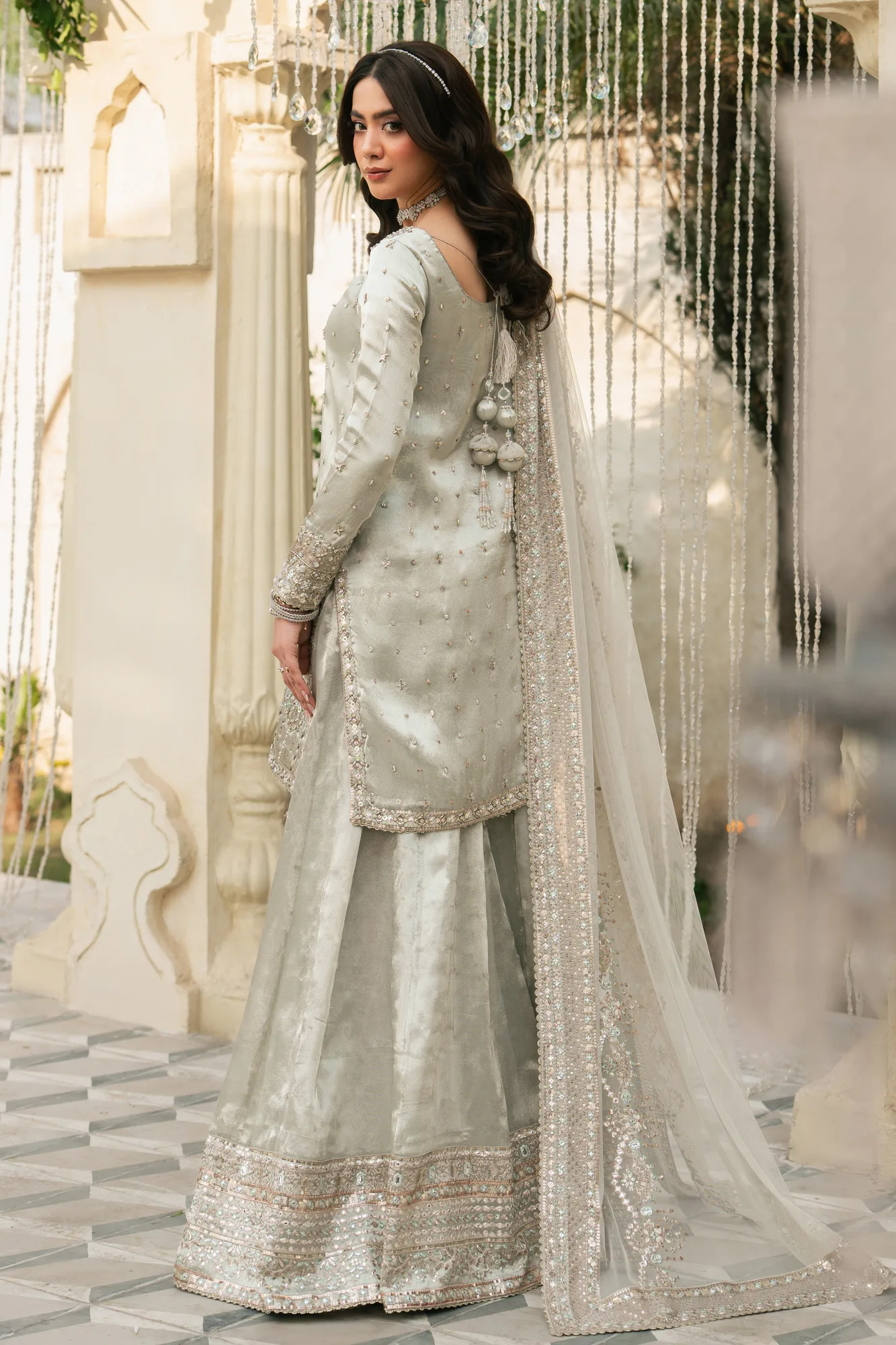 Silver 3‑piece formal outfit with tissue top, net dupatta and flared sharara – view 2 – Poshaq