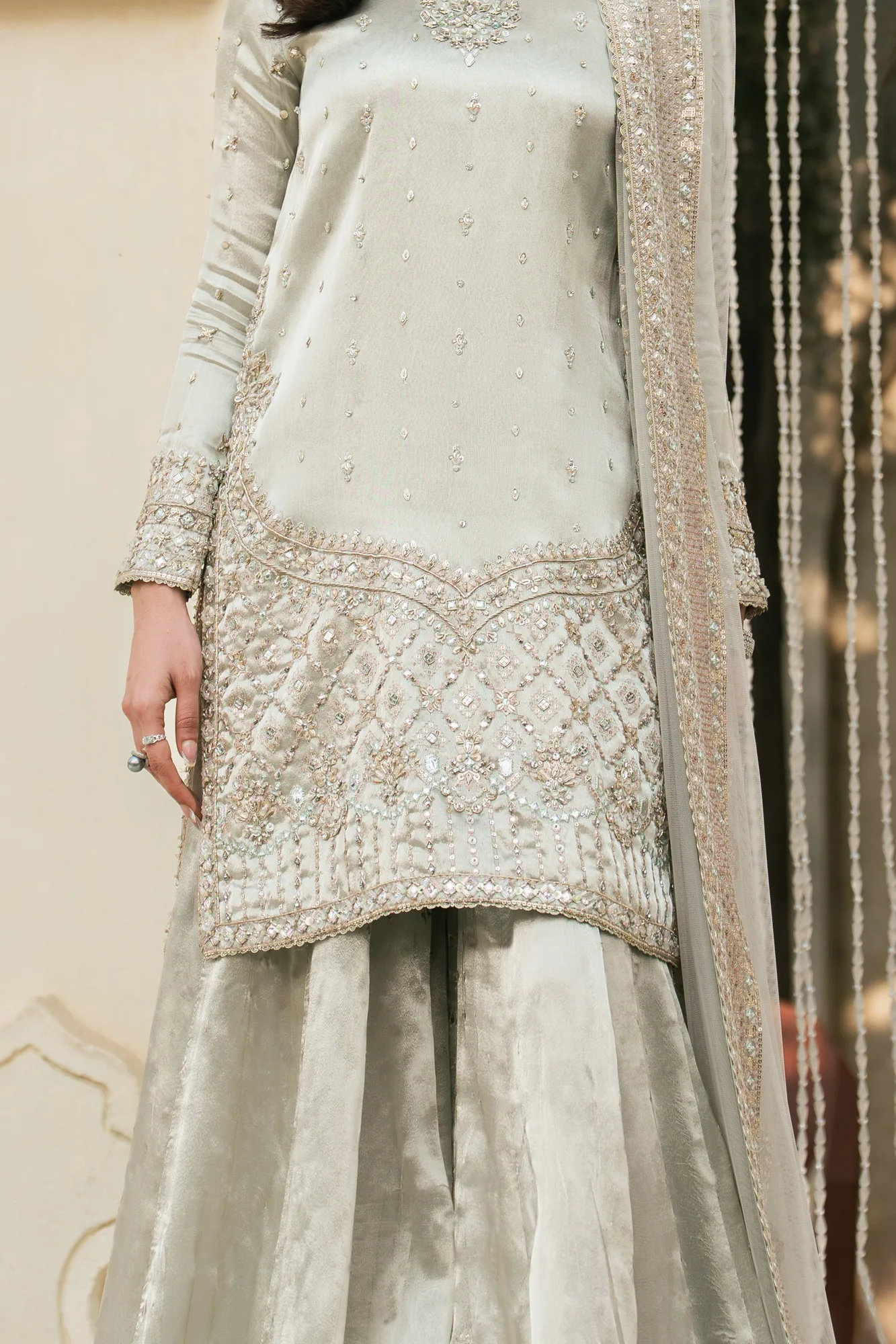 Silver 3‑piece formal outfit with tissue top, net dupatta and flared sharara – view 4 – Poshaq
