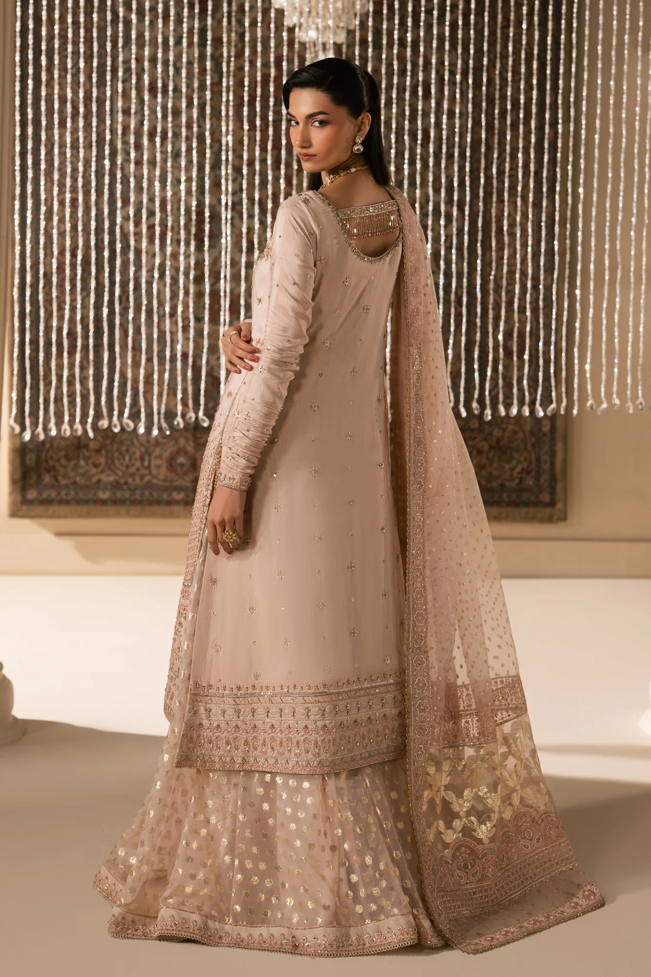 Pink formal outfit with silk shirt, organza sharara, dupatta and raw silk pouch – view 2 – Poshaq