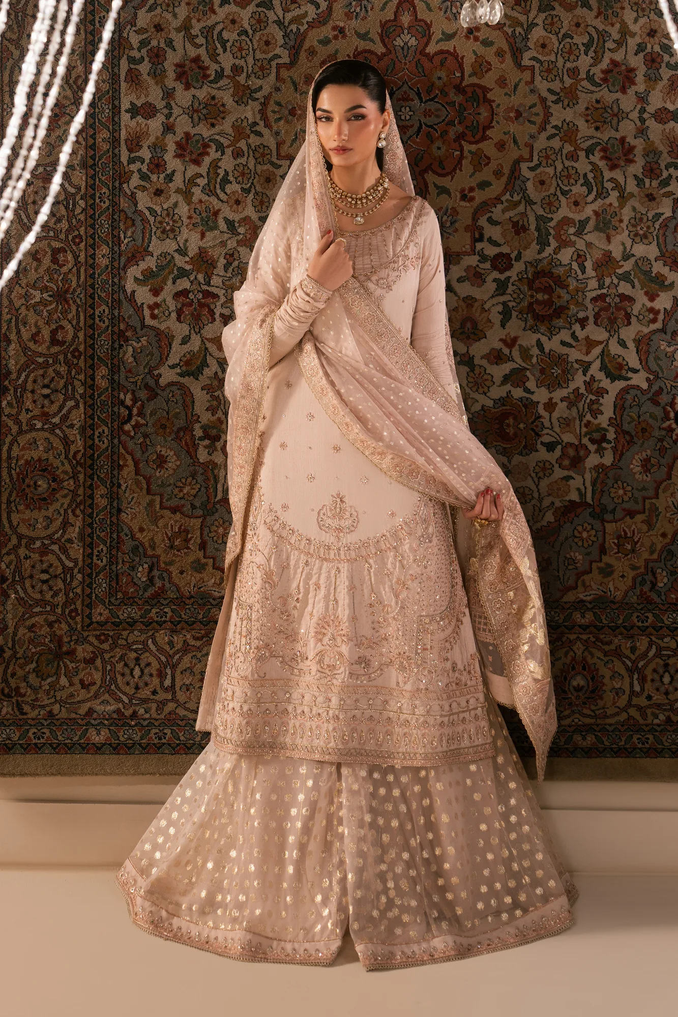 Pink formal outfit with silk shirt, organza sharara, dupatta and raw silk pouch – view 4 – Poshaq