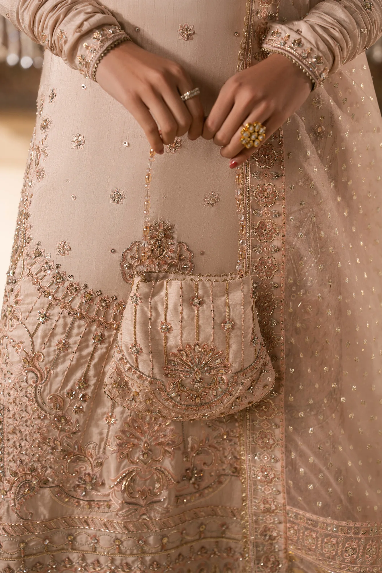 Pink formal outfit with silk shirt, organza sharara, dupatta and raw silk pouch – view 5 – Poshaq