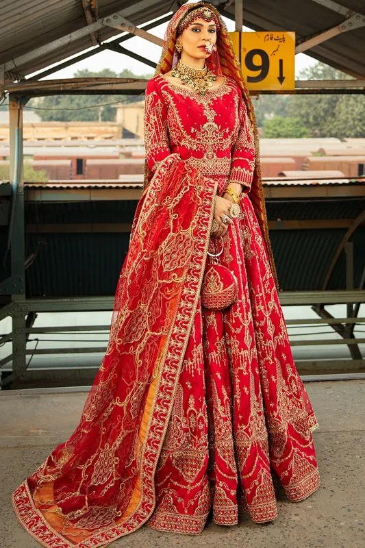 Red formal lehenga with intricate embroidery and structured choli – view 1 – Poshaq