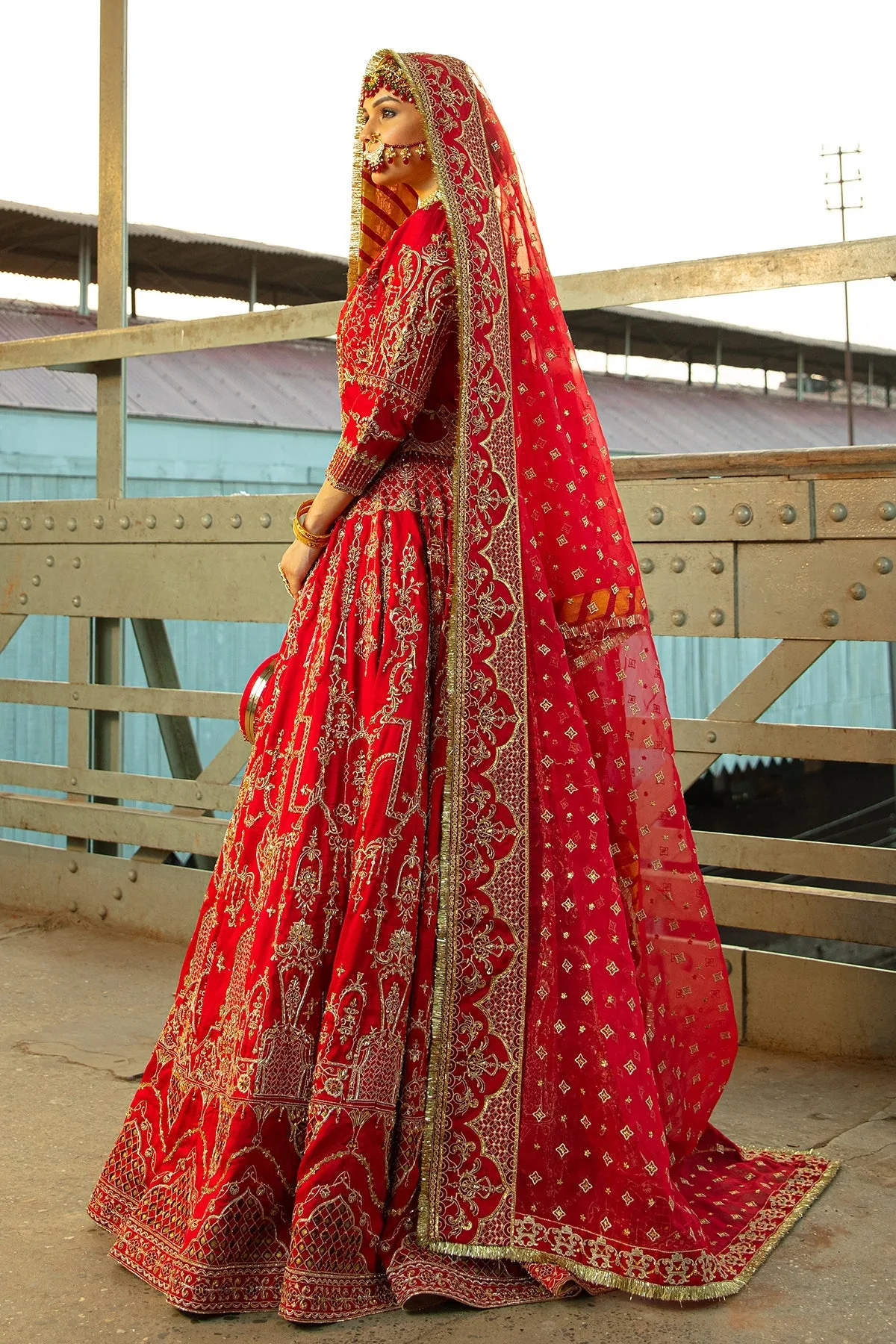 Red formal lehenga with intricate embroidery and structured choli – view 3 – Poshaq