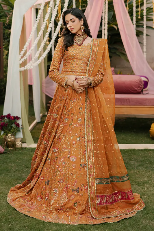 Gold organza lehenga with sleek bodice and flowing skirt – view 1 – Poshaq