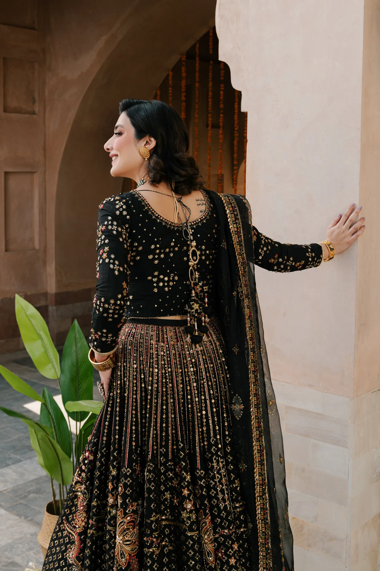 Orange raw silk and organza lehenga choli set with flowing skirt – view 2 – Poshaq