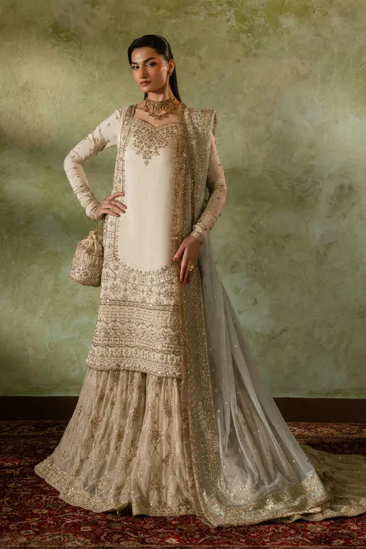 Peach formal three‑piece suit with raw silk shirt and net gharara – view 1 – Poshaq