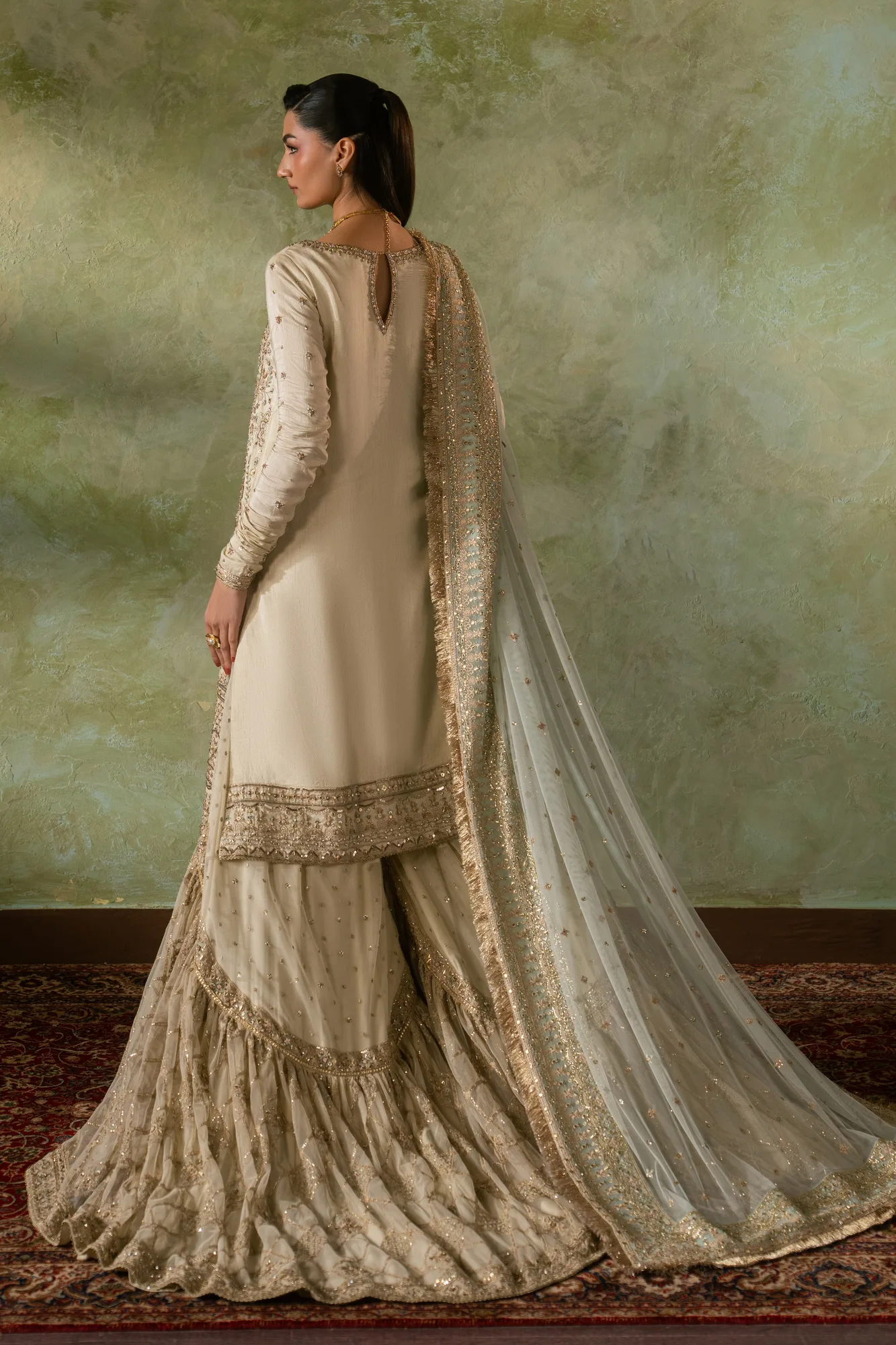 Peach formal three‑piece suit with raw silk shirt and net gharara – view 2 – Poshaq